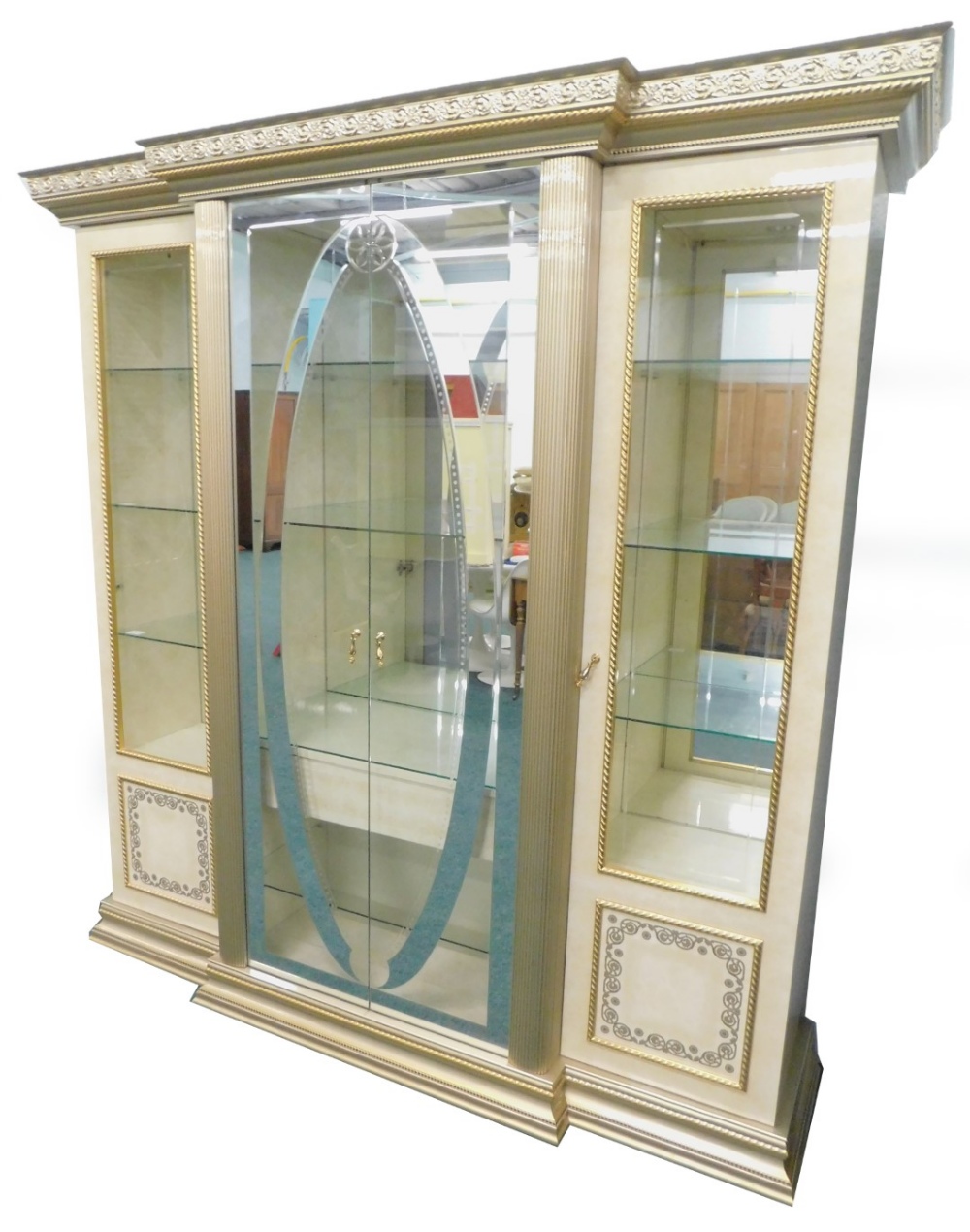 An Arredo Italian simulated marble and parcel gilt breakfront display cabinet, the top with a