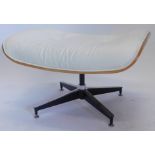 A rosewood and cream leather stool, after a design by Charles and Ray Eames, rectangular top on a