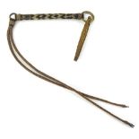An African woven horse or animal whip, with cast brass washer, etc., 87cm long.