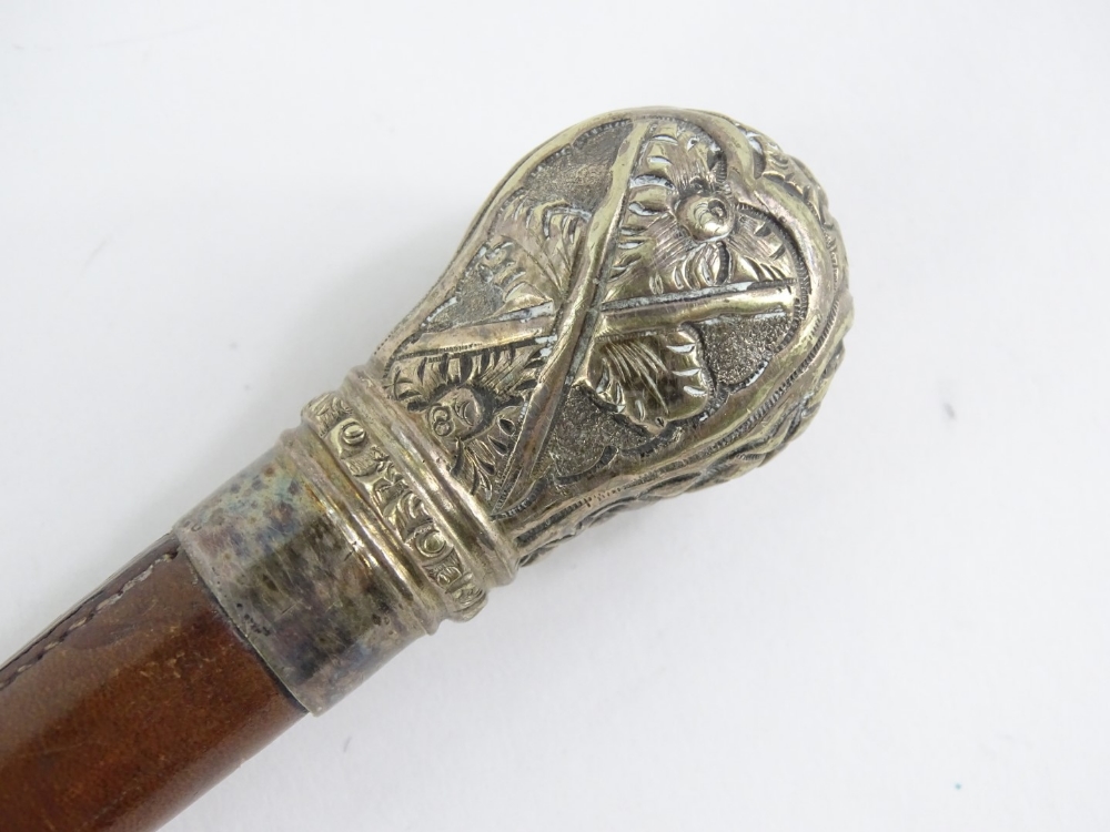 A brown leather riding crop, with gilt white metal mounts cast and embossed with flowers, etc., - Image 2 of 3