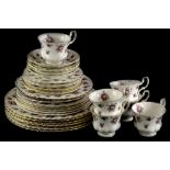 A Royal Albert Sweet Violet pattern part tea service, to include six cups and five saucers, etc.