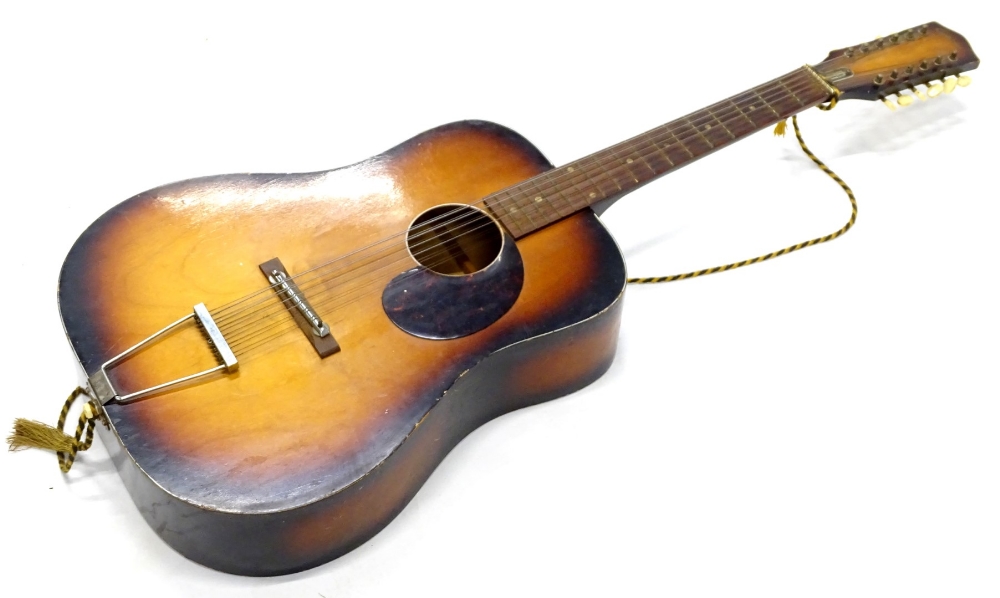 An Egmond Brothers Limited Dutch acoustic guitar, with bone keys etc., 109cm high.