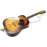 An Egmond Brothers Limited Dutch acoustic guitar, with bone keys etc., 109cm high.