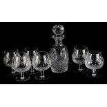 A Waterford crystal spirit decanter and stopper, and six Waterford crystal glasses, both boxed.
