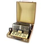 A Sorrento Italian piano accordion, in fitted case (AF).