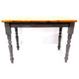 A pine kitchen table, with a rectangular top on a grey painted base with turned legs 72cm high,
