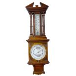 A late 19thC walnut aneroid barometer, the dial stamped J H Steward, 406 Strand, 457 West Strand,