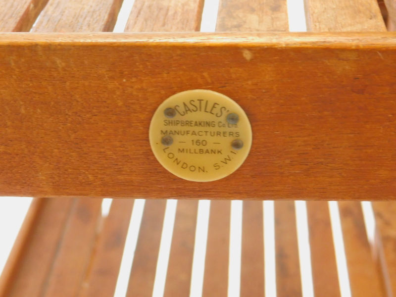 A teak slatted three tier trolley, on spoked wheels, label for Castles Ship Breaking Company - Image 2 of 2