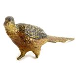 An early 20thC bronze model of a pheasant, in the manner of Bergman, (AF), 12cm long.