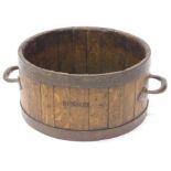 A coopered log bin or wine cooler, constructed from a grain bushel, with metal handles, 64cm wide.
