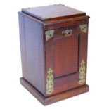 A late 19thC mahogany and brass coal purdonium, the panelled fall front drawer with ebonised