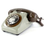 An unusual type 706 grey telephone, with chrome dial, bell on/off switch.