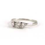 A Victorian three stone diamond ring, with three round brilliant cut diamonds, totalling approx 0.