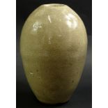 A studio pottery bullet shaped vase, with all over cream crackle glaze, indistinct M or E mark to