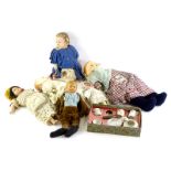 A quantity of dolls, to include a German bisque headed example, (some AF, 6), and a dolls tea set.