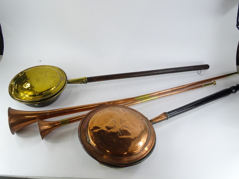 Two copper and brass hunting horns, a copper warming pan and a brass warming pan, each with a turned - Image 2 of 2