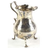 An Edwardian baluster shaped cream jug, with scroll handle, engraved Francis Edward Savin Bowlby