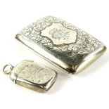 A George V silver small cigarette case, engraved with leaves and with a monogram, Birmingham 1912
