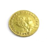 A George I gold quarter guinea, dated 1718, worn.