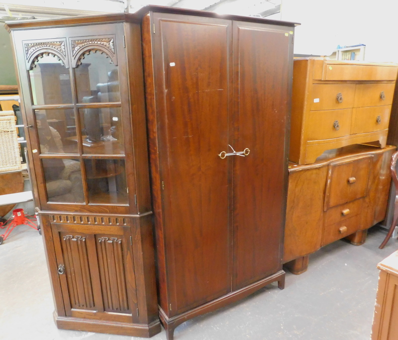 A Stag style double wardrobe, an oak Old Charm style freestanding corner cabinet, a burr walnut