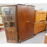 A Stag style double wardrobe, an oak Old Charm style freestanding corner cabinet, a burr walnut