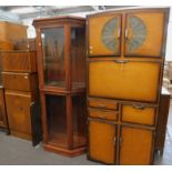 A mid 20thC freestanding kitchen unit, with various cupboards and drawers, a two tier glazed front