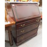 A mahogany bureau.