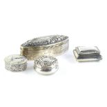 A collection of small silver and white metal boxes, to include a navette shaped box, with hinged
