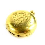 An 18ct gold sovereign case, of circular form bearing the initials COP, hallmarked for 18ct gold,