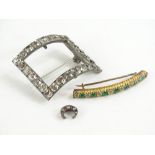 Three pieces of Victorian and later jewellery, comprising horseshoe silver framed stick pin top (AF)