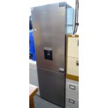 A Grundig brushed steel effect fridge freezer with water dispenser.