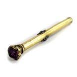 A Victorian 9ct gold pencil case, set with shield shaped single amethyst stone to top, with engine