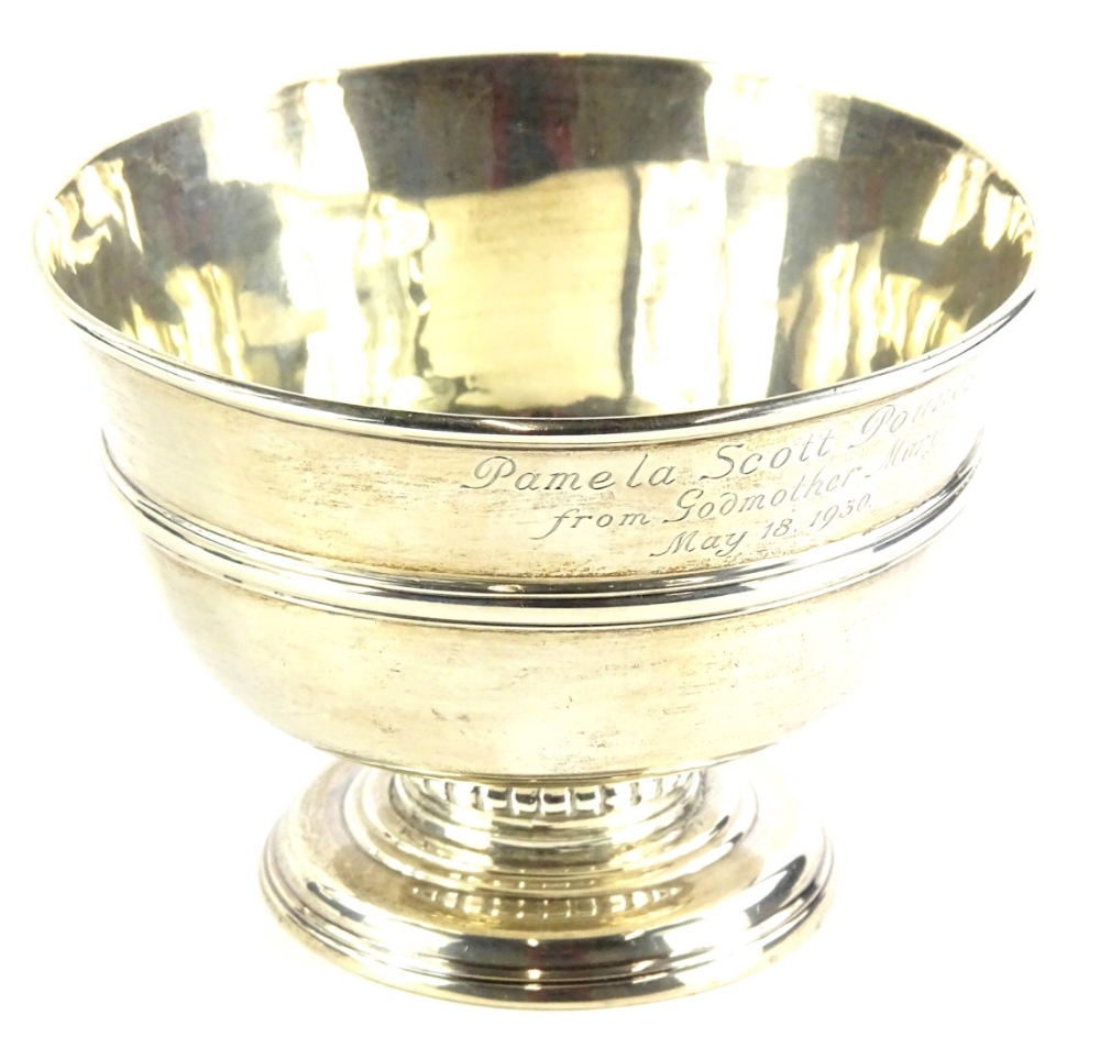 A George V silver bowl, of plain form, on a domed foot, engraved Pamela Scott Pounds from