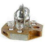 An unusual Shell Oil boardroom drinks decanter set, formed as a refinery drum, with front tap