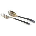 A pair of Gorham American silver plated salad servers, each with an ebonised handle, stamped Gorham,