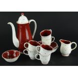 A Susie Cooper bone china part coffee service, decorated with red and white spots, to include coffee