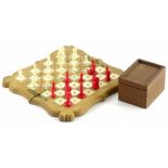 A late 19thC ivory travelling chess set, with fruitwood board, mahogany case with sliding lid, the