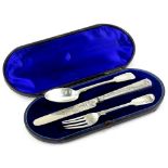A George V silver christening set, comprising fiddle pattern spoon and fork and a knife, each