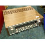A Sony Vintage FM stereo receiver, in simulated wooden case.