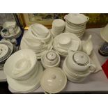 A large quantity of white glazed porcelain, various makers, some possibly seconds.
