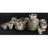 A 19thC Spode part tea and coffee service, decorated with flowers, leaves, etc., in Imari colours,