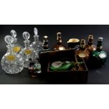 Various spirit related items, to include a set of four Remy Martin & Co decanters, an Armanac