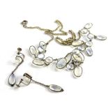 Various imitation moonstone jewellery, comprising a graduated imitation moonstone set necklace, on a