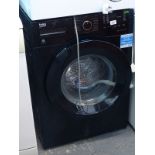 A Beko black coloured washing machine.