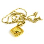 Shell Fuel Company interest. A 22ct gold Shell logo pendant, set with two diamonds, on a fancy