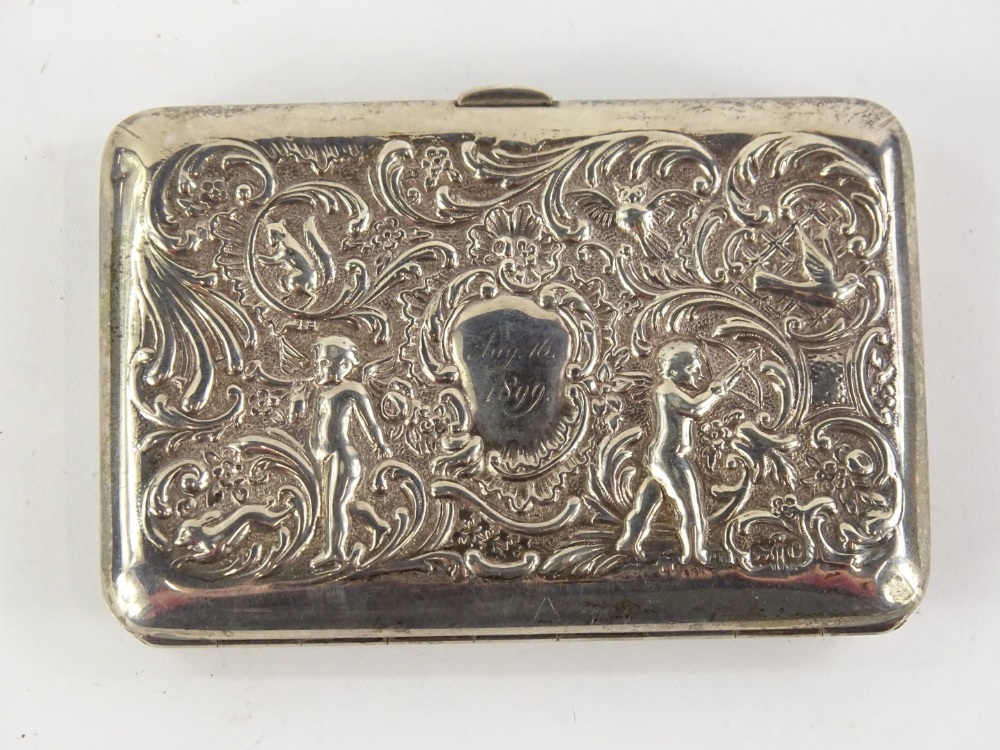 A late Victorian silver cigarette case, case with putti, scrolls, etc., surrounding a cartouche - Image 2 of 2