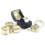 A collection of six various silver napkin rings, of differing design and date, 4¾oz, one cased.