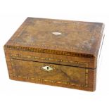 A Victorian walnut and parquetry jewellery box, the hinged lid with a tulip wood border and a vacant