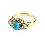 An 18ct gold turquoise and diamond set elaborate dress ring, the small oval turquoise stone in