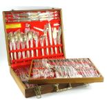 A canteen of Santi Jewellery cutlery, with serving pieces, settings for 12, in original wrappers, in